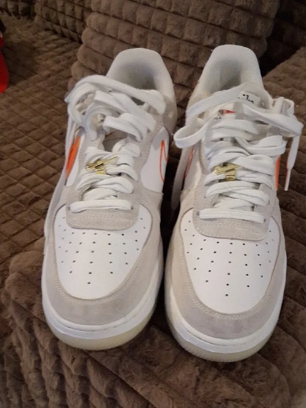 Nike White and Beige Low-Top Sneakers with Black Swoosh
